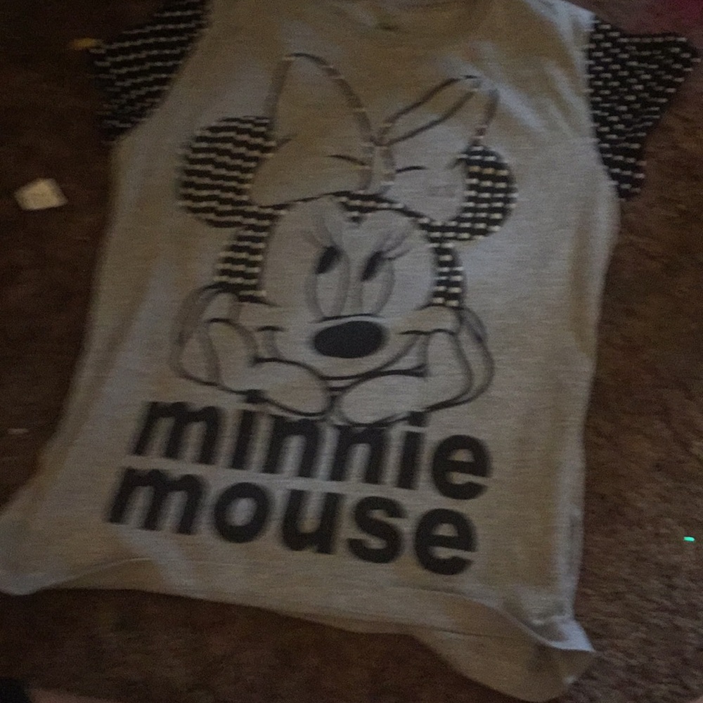 It is a black gray and white Minnie Mouse shirt